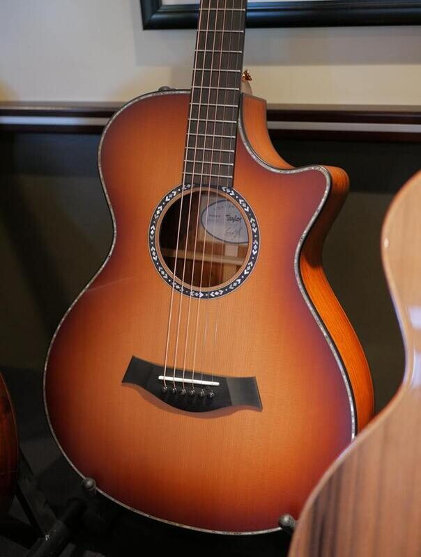 Some photos of some very fine looking Taylor guitars
